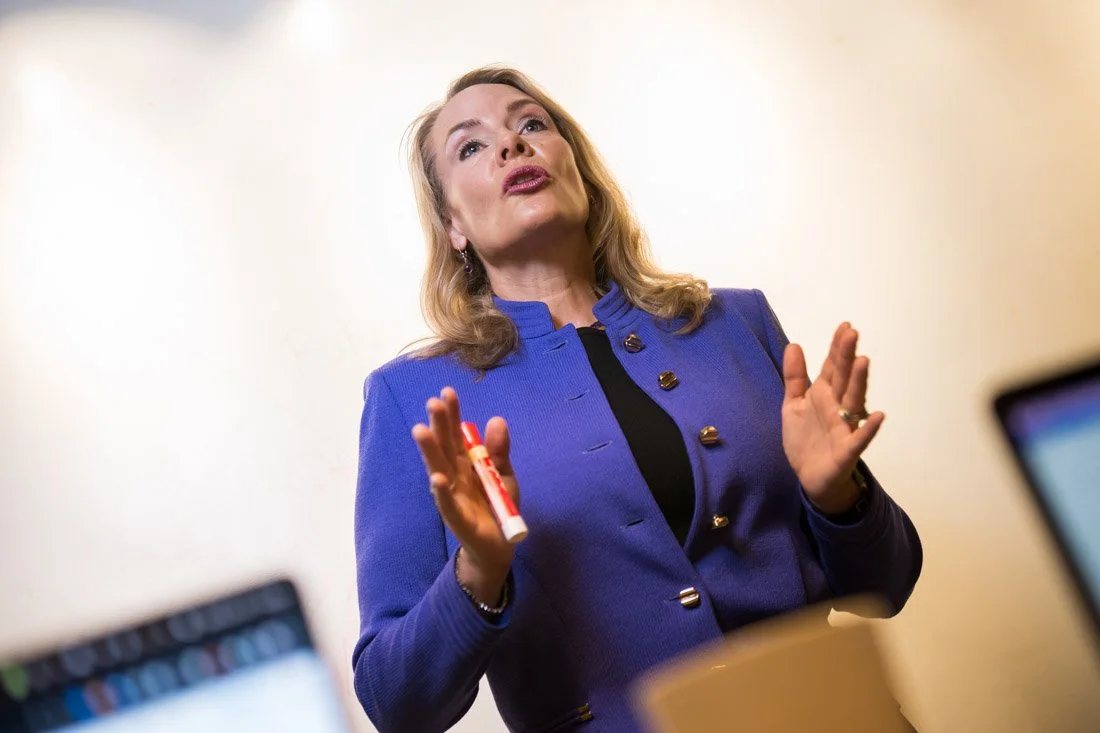 Viveka von Rosen mid-presentation, gesturing while explaining a concept